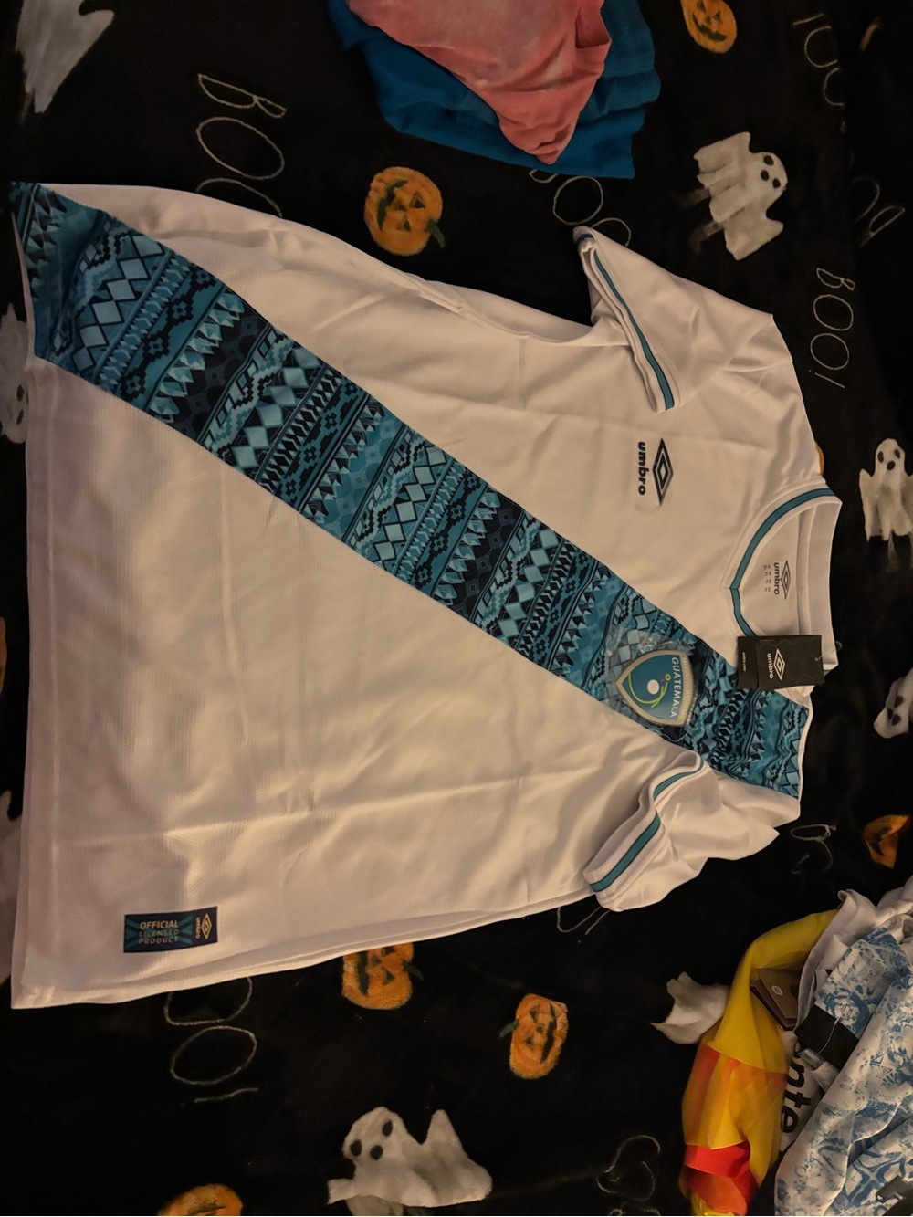 Umbro White Soccer Jersey with Teal Diagonal Pattern